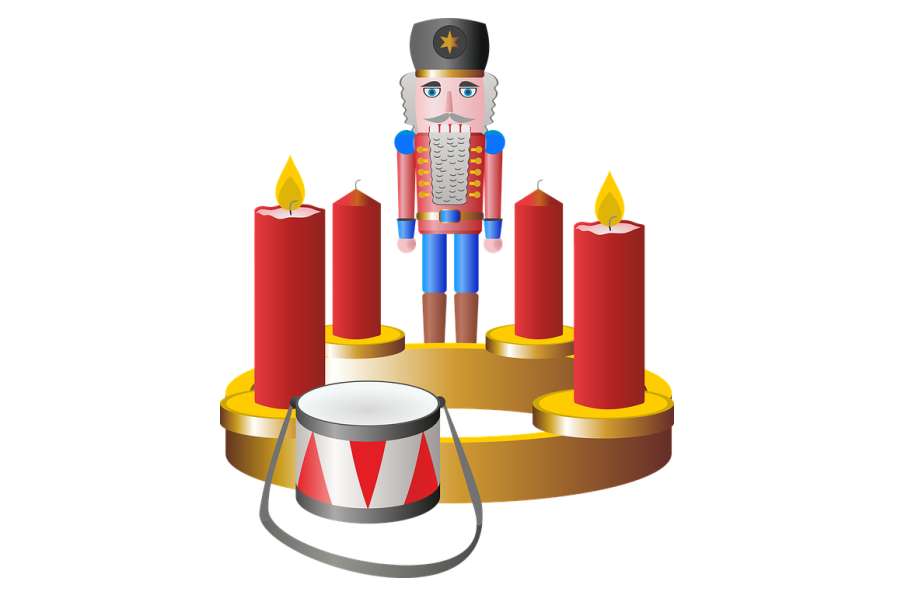 Rysunek przedstawia namalowanego żołnierzyka, werbel oraz cztery świece.