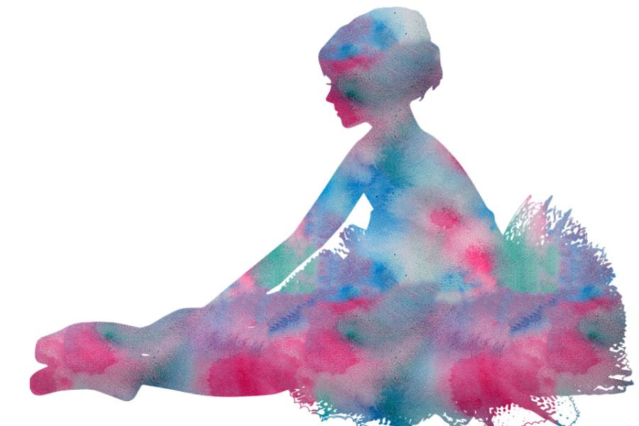 Zdjęcie przedstawia kolorową baletnicę siedzącą na podłodze